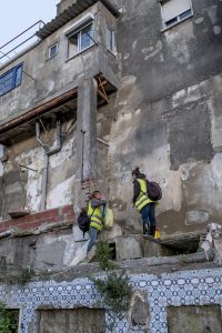 Portugal, Lisbon. 2016-12-07. Social  workers Andreia Alves and Rita Lopes collect waste such as syringes in the neighbourhood of Casal Ventoso. A Decriminalisation Law was introduced in 2011, based on the assumption that the drug user is a citizen that needs support in the health and social areas.