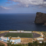 Portugal, Azoren. 2007.  A football field at the sea shore near the capital Velas of São Jorge Island.