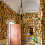 Portugal, Alentejo, Elvas. 2016. The shrine of 'Nosso Senhor Jesus da Piedade' where worshippers offer ex-votos and burn candles and pray for cure and protection