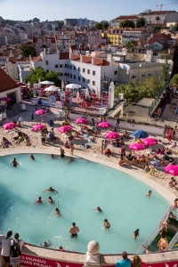 Portugal, Lisbon, Jardim do Torel. 2014. The hugely popular urban beach in the city center. Entrance is free. Due to the recession many inhabitants spend their holidays at home.