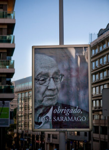 Portugal, Lisbon. 2010. A street poster with the portrait of Portuguese writer and Nobel prize winner for literature José Saramago (1922-2010) with the words 'Thank you, José Saramago'.