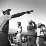 Botswana, Chobe river. 1992. A local guide tells American tourists about Africa's wildlife.