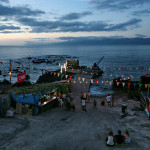 Portugal, Azores, Pico Island. 2008. Party at Ribeirinha on the Atlantic Ocean shore.