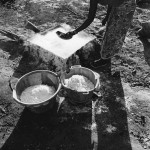 Guinea-Bissau, K3 village, located on the outer marshes of the Cacheu river. 2005. A woman boils the salty water in order to extract the salt.