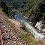 Portugal, Trâs-os-Montes. 2015. The Tua railway, constructed in 1887, is regarded as one of the top ten of the world's most spectacular tracks. A dam was completed near the town of Tua mid 2016. About 25 kilometers of the railway track and of the Tua valley are being submerged thus destroying unrivalled natural beauty. The changing micro climate is also expected to affect the nearby Douro valley, a major wine producing area as well as UNESCO World Heritage.