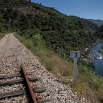 Portugal, Trâs-os-Montes. 2015. The Tua railway, constructed in 1887, is regarded as one of the top ten of the world's most spectacular tracks. A dam was completed near the town of Tua mid 2016. About 25 kilometers of the railway track and of the Tua valley are being submerged thus destroying unrivalled natural beauty. The changing micro climate is also expected to affect the nearby Douro valley, a major wine producing area as well as UNESCO World Heritage.