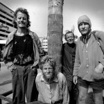 Zimbabwe, Manicaland. 1994. Four homeless persons from South Africa pass by in the town of Mutare in eastern Zimbabwe.