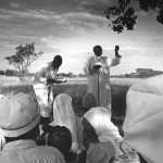 Zimbabwe, Harare. 1993. A priest prays at a ceremony of the Zion church in the open field in the Hatfield suburb.