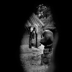 Zimbabwe, Mvurwi. 1988. A Shona sculpture on display in the open air in front of the house of sculptor Samwell Chirume at the Tengenenge community. Some 40 sculptors work here, producing the highly acclaimed Shona works of art.