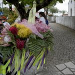 Portugal, Estremadura, Santa Catarina da Serra. 2017. A pilgrim carries a statue of Virgin Mary. He is part of a group of 300 pilgrims, all from the coastal town of Espinho near Porto, that walks the distance of approximately 200 km to the shrine of Fatima during a five day-pilgrimage.