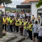 Portugal, Estremadura, Santa Catarina da Serra. 2017. Pilgrims pray in front of a statue of Virgin Mary. They are part of a  group of 300 pilgrims, all from the coastal town of Espinho near Porto, that walks the distance of approximately 200 km to the shrine of Fatima during a five day-pilgrimage.