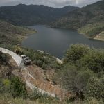 Portugal, Alto Douro, near the village of Tua. 2017. The storage reservoir of the Foz Tua dam that has completely submerged the historic Tua railway. A mooring is under construction to promote tourism (sic).