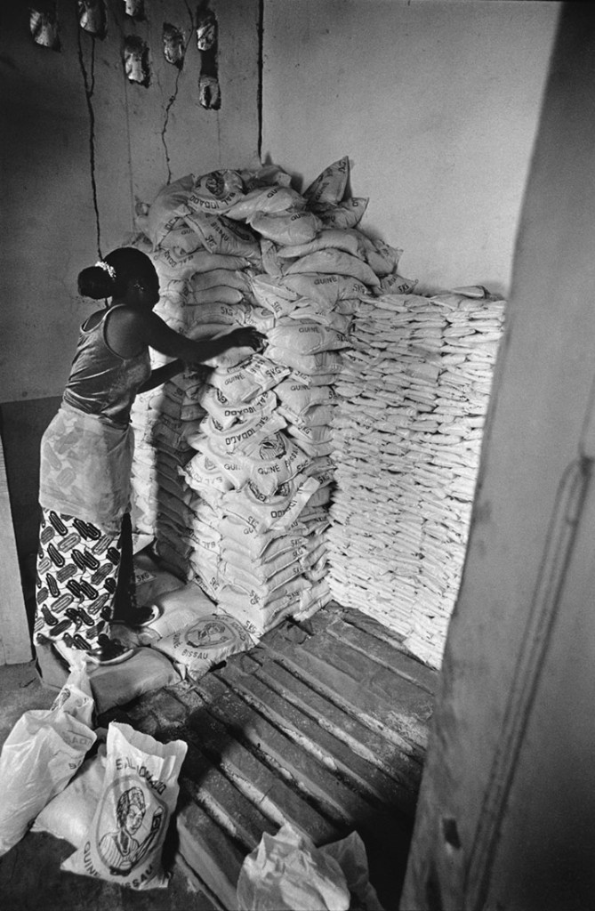 After silt has been collected from the river outer marshes, women filter the silt with water and obtain good quality salt that they sell on the market.